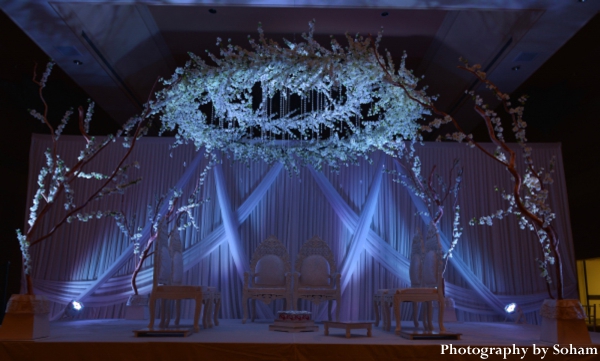 Indian wedding mandap ideas with flowers and branches.