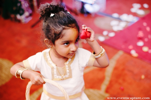 Indian wedding flower girl in white outfit