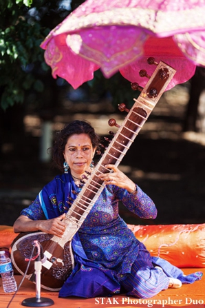 Sitar player at indian wedding ceremony
