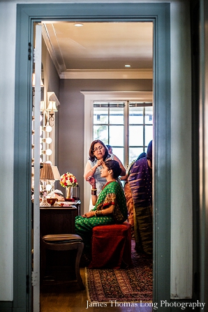 South Indian bride gets bridal hair and makeup done.