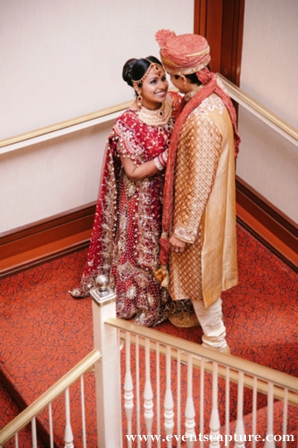 Indian bride and groom in wedding portrait.