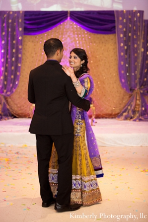 indian bride in yellow engagement party lengha