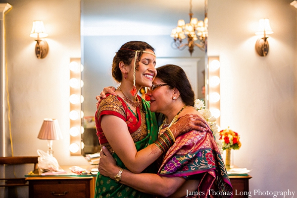 South Indian bride with her mom in a traditional sari.