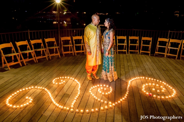 Indian bride and groom portrait at outdoor indian wedding venue