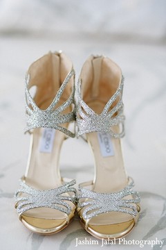 A bride rocks some Jimmy Choos for her reception.