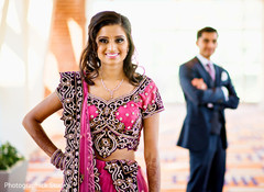 This Indian bride poses for lovey portraits at her reception.