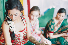 This bride prepares for her upcoming wedding with beautiful mehndi.