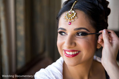 This Indian bride gets all dolled up for her wedding day.