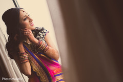 An Indian bride and her groom celebrate the beginning of their wedding festivities!