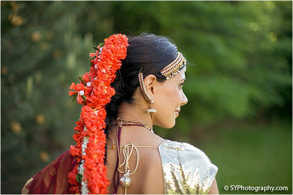 Indian bridal hair accessories, like the beautiful flowers, are a must for an Indian bride.
