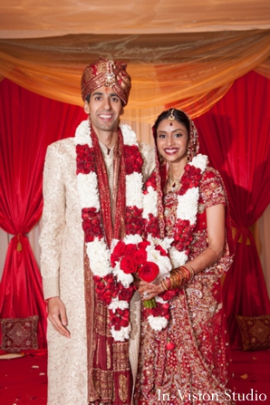 indian bride and groom at their indian wedding ceremony.