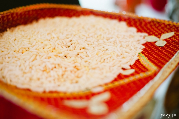 Indian wedding tradition with uncooked white rice